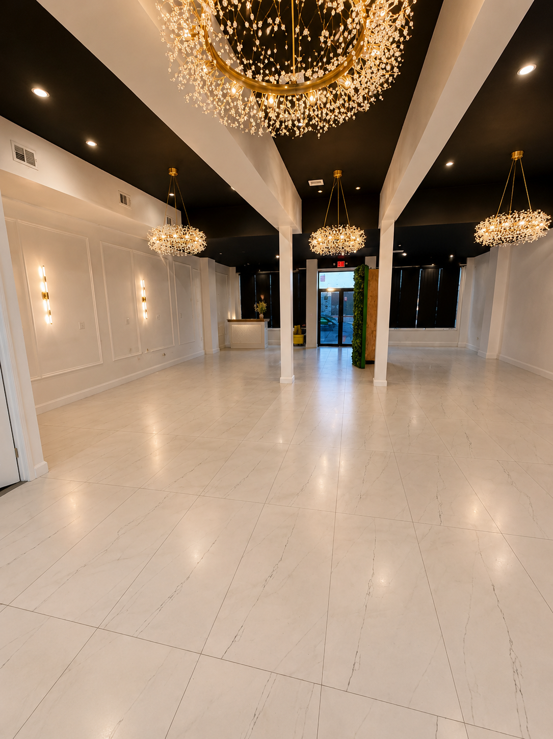 Bright empty gallery hall with tall windows